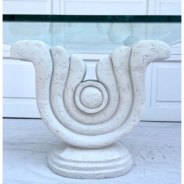 Here is a wonderful Postmodern piece that features a textural, plaster base with a thick glass top. The shape of the base...