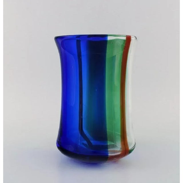Erik Höglund (1932-1998) for Kosta Boda. Unique "Chribska" vase in polychrome mouth-blown art glass. Dated 1992. Measures:...
