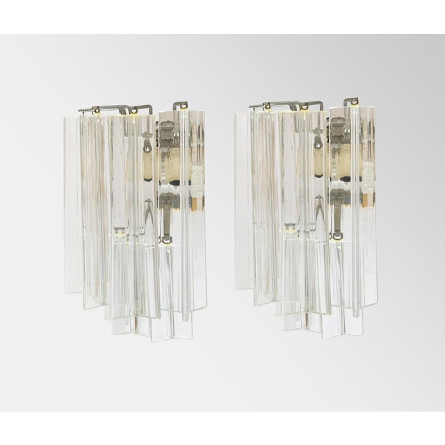 Pair of appliques with large trilobed glass pendants, Murano, 1960s. Structure in chromed metal. H cm 36 Good condtions Up...