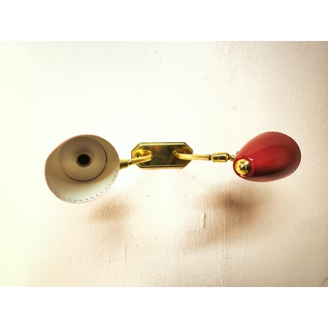 Adjustable Double Light Wall Lamp in Brass from Stilnovo, 1960s, in Very Good conditions. Designed 1960 to 1969 Up to 250V...