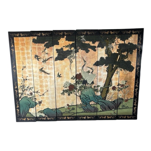Stunning Mid-20th century Chinese export six-panel coromandel screen with gold leaf. Features an incised landscape with...