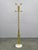 Elegant Italian modern coat rack produced in the 1970s featuring a polished brass-plated metal construction with...