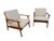 Stunning pair of Mid-Century Modern walnut arm chairs dating back to the 1960s! These beautifully restored lounge chairs...