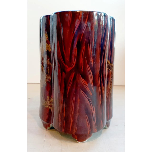 Chinese porcelain faux bois gilt dragon brush pot, faux bois glazes of mahoganies, burnt umbers and blacks on the two wide...