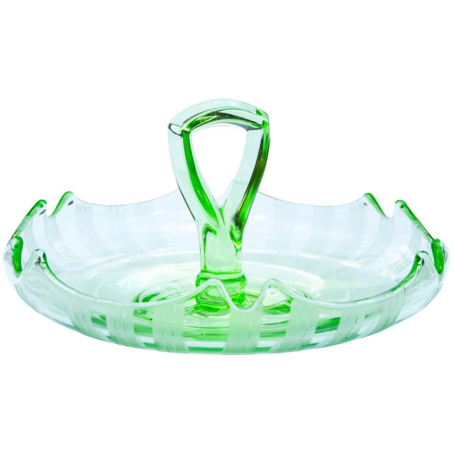 Gorgeous and playful antique very-heavy glass centerpiece. Meticulously handblown exhibiting an elaborate sleek silhouette...