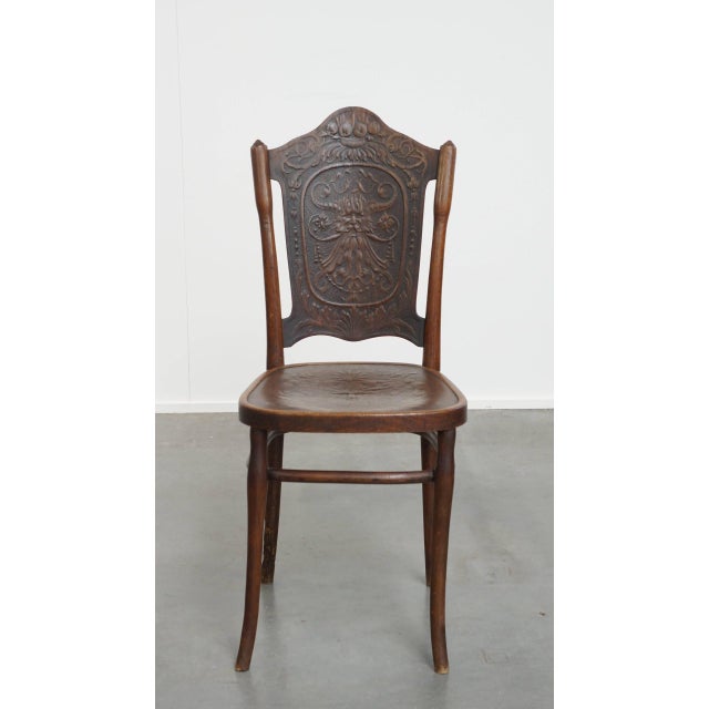 This wonderful, original antique Jacob and Josef Kohn chair dates from the early 20th century and features beautiful...