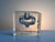 Massive, clear glass block vase made of ice glass in a square shape with an integrated optical body that impressively...