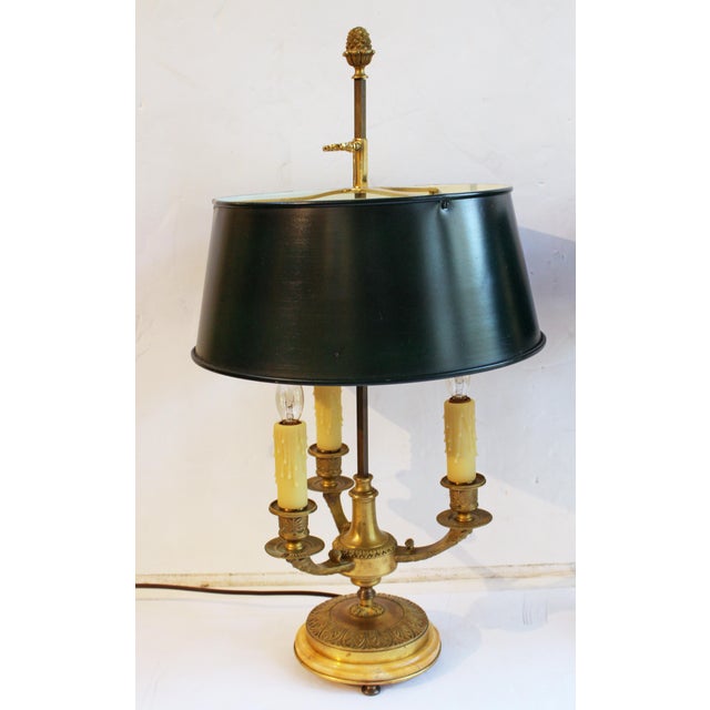 Circa 1920 pair of French bronze & marble bouillotte lamps. A very fine pair with beautifully restored tole shades. Greco-...