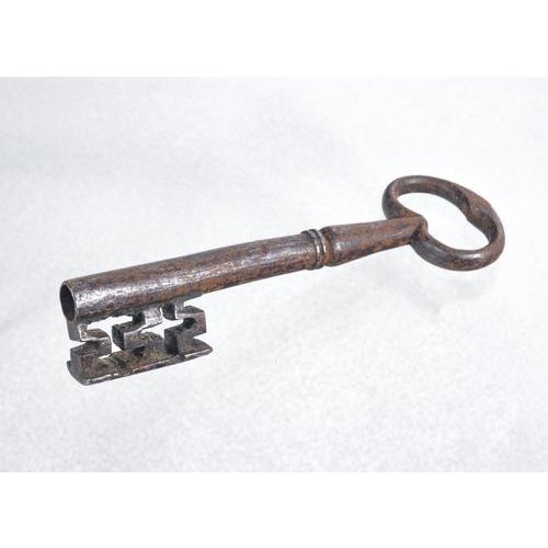 Antique lock with key in forged and wrought iron. 18th-19th century. Period 18th-19th century. Materials forged and...