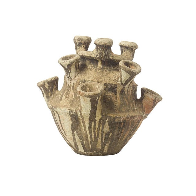 This one-of-a-kind unglazed clay sculpture is handcrafted in Morocco using traditional Tamegroute techniques. Shaped...
