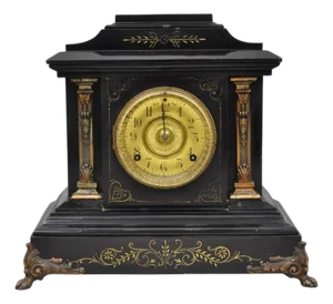 Antique Ansonia Black Mantel Clock With Bronze Coated Columns and Claw Feet