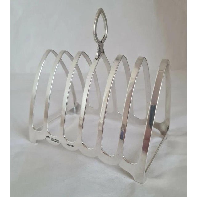 A fine english solid sterling silver seven-bar toast rack by s. Blanckensee & son ltd, hallmarked in birmingham in 1933...