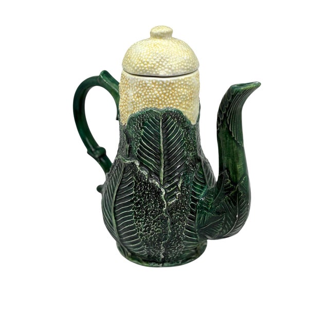 Majolica green cabbage cauliflower tea pot. Cauliflower floret lid and drapes down the neck of the kettle. Green detailed...