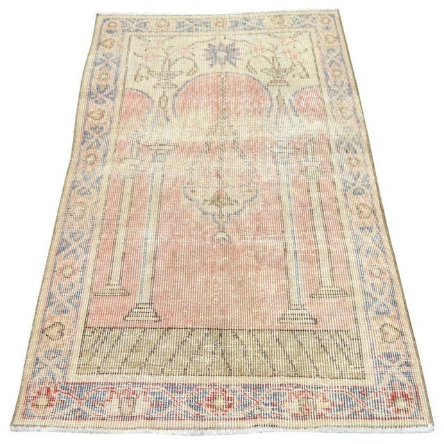 Hand-knotted with care using traditional rug-making techniques, this wool rug blends timeless craftsmanship with a modern...