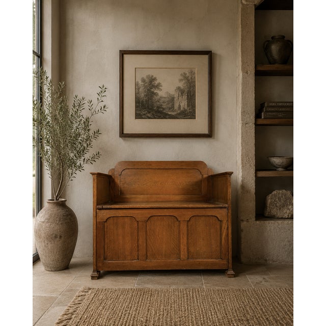 An early 19th century English monks bench, handcrafted from solid oak and dating to circa 1800. Compact in scale yet full...