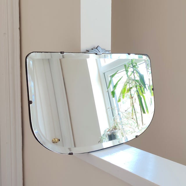 A superb example of an art deco hanging wall mirror in a rectangular shape with curved base. This lovely mirror features...