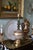 An exceptionally decorative vintage table lamp distinguished by its luminous satin-glass body, layered gilded finishes,...