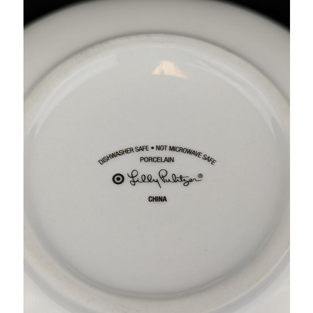 Lilly Pulitzer XXO for Target plates. Whimsical and vibrant 4 piece set in 4 different colors and patterns with 18k gold...