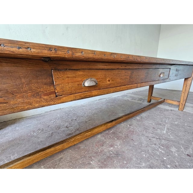 Splendid and original large refectory table, approximately 3 meters long, dating back to the early 1900s and made from...