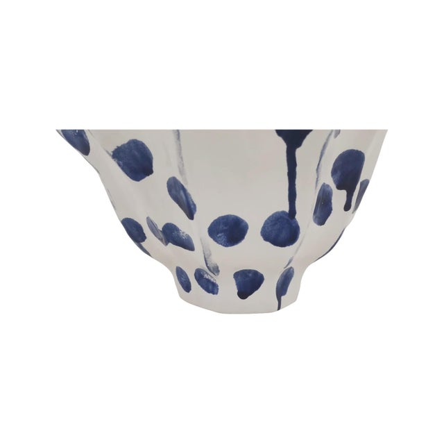 Playful and full of personality, this ceramic vase set features sculptural, rounded forms brought to life with hand-...