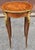 A Louis XV Style Ormolu Gilt Bronze Mounted Kingwood and Tulipwood Gueridons with impressive, clean lines marquetry works...