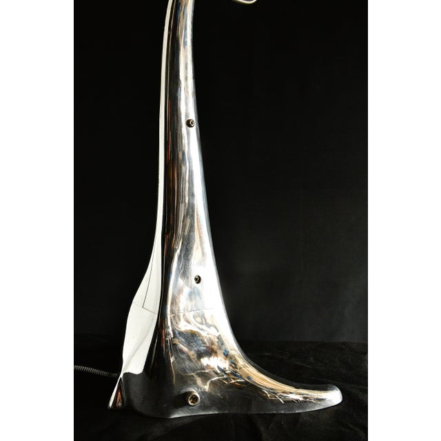 Microprojector from 1950s converted into a table lamp. Cast aluminum body with an articulating head, it is fitted with a...