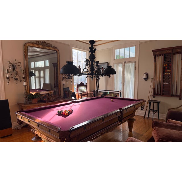 The Monarch: This magnificent Brunswick Blake Collender pool table embodies elegance and grace, tastefully inlaid with...