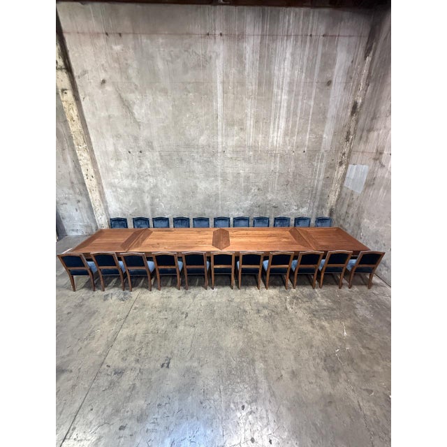 A monumental custom American walnut dining table by Uhuru Design (Brooklyn, NY), commissioned in 2010 for George Clooney’s...