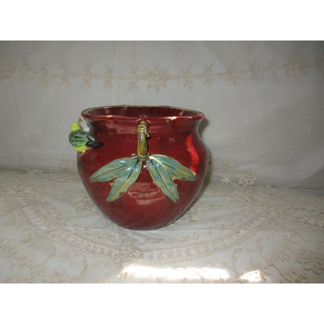 This is a Beautiful! Vintage Majolica French Country Cachepot that is in a Dark Red with Yellow and Blue Birds and has a...