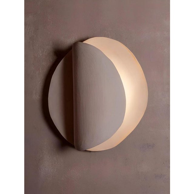 Onde #2 wall light in sandy stoneware by margaux leycuras. One of a kind, signed and numbered. Dimensions: d 16 x w 46 x h...