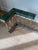 Vintage English Steel and Brass Fireplace Fender With Green Leather Tufted Seat For Sale - Image 9 of 11