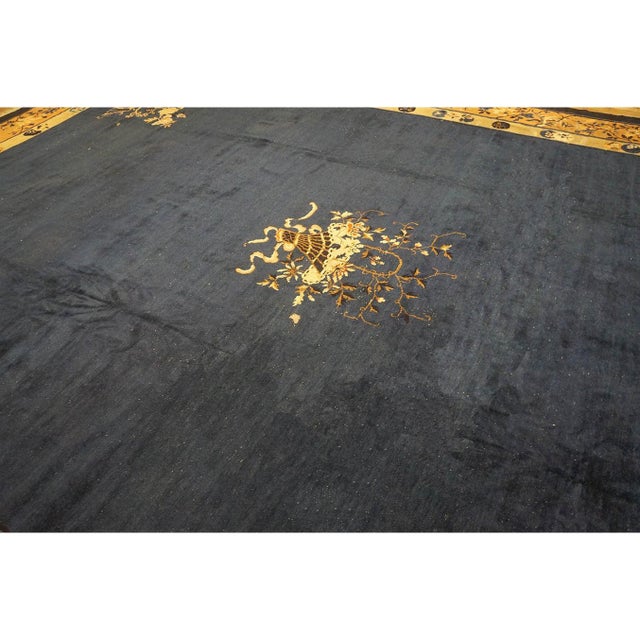 Antique Large Chinese - Peking Chinese Floral, Medallion Knotted Rug, Circa Date: 1920s. This exceptional antique piece...