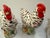 A charming pair of hand-painted bisque porcelain hen salt and pepper shakers, made in Japan in the mid-20th century. Matte...