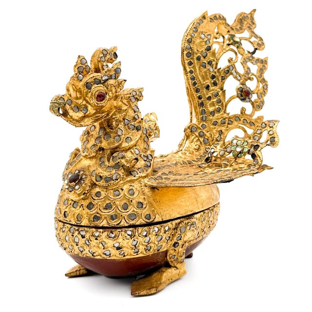 Bring a piece of Southeast Asian history and art into your home with this magnificent vintage Burmese Hintha bird-shaped...