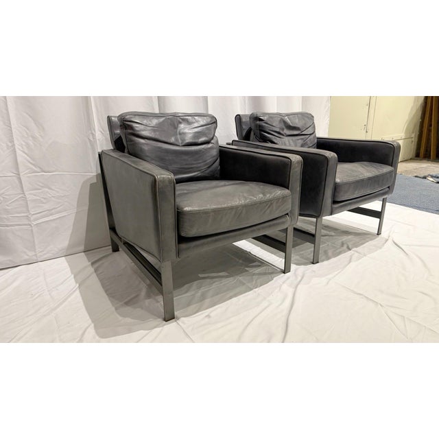 The Chazzie Club Chair showcases timeless elegance with its plush top-grain leather upholstery, offering a luxurious and...