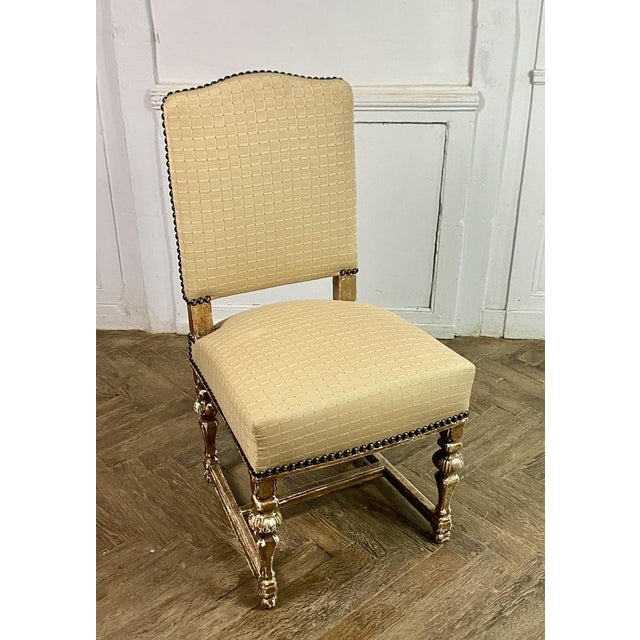 Beautiful set of 8 louis xiv style chairs with baluster base in gilded wood connected by a spacer. The set has been...