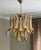 Pair of two Small Bold Eclectic Amber Colored Murano Chandeliers. Petal Formed Glass Prisms in Traditional Italian Mid-...