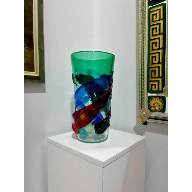 This lovely and colorful vintage vase was created by noted Glass Masters at Fratelli Toso in Murano. Signed. Measures 14"...