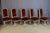 Rare set of 12 Directoire-style chairs in painted beechwood, dating from the second half of the 20th century. These chairs...