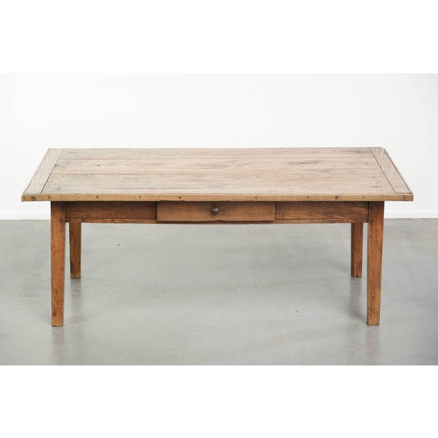 This beautiful antique pinewood coffee table features a drawer, a lovely patina, and a charming rustic look. Coffee tables...