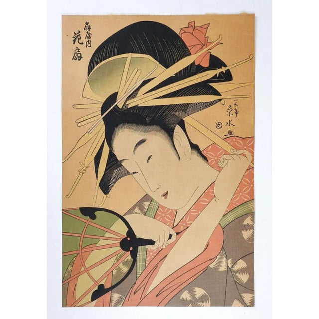 Vintage mid 20th century Japanese woodblock reprint of a beautiful courtesan with a fan by Ichirakutei Eisui. Unframed,...