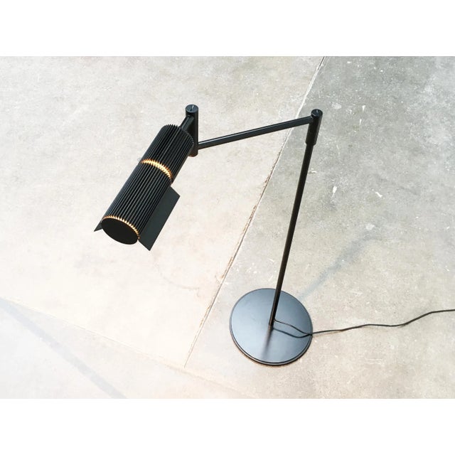 Rare floor lamp from Swisslamps. The design dates back to the 70s. The floor lamp draws its elegance from a technical...