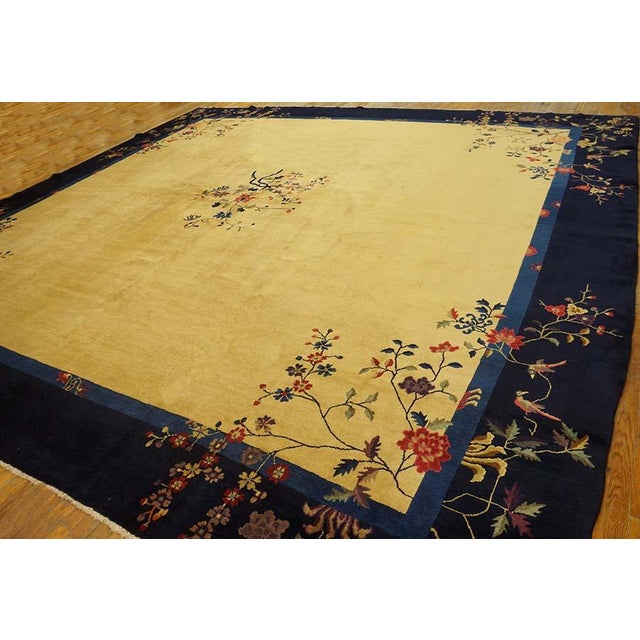 Room Size Antique 1920s Chinese Peking Ivory Knotted Wool Square Rug, Circa Date: 1920s. This exceptional square Peking...