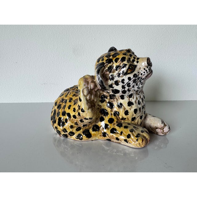 Add a touch of playful charm to your decor with this delightful pair of vintage Italian ceramic tiger cub figurines....