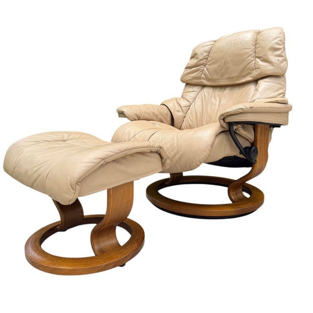 A classic Ekornes Stressless Reno recliner and matching ottoman, crafted in Norway. Known for its exceptional comfort and...