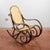 This rocking chair embodies the timeless elegance of the thonet style, an icon of period design that revolutionized...