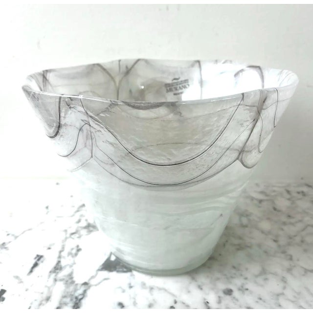 Add an artful touch to your home with this oversized Murano glass vase. Handcrafted from the finest Italian makers, this...