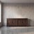 Forged with an uncompromising architectural vision, this imposing French brutalist credenza transforms the atmosphere of...