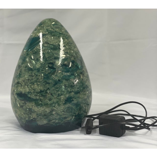 Green fractal resin lamp from the 70s This piece is attributed to the mentioned designer/maker. It has no attribution mark...