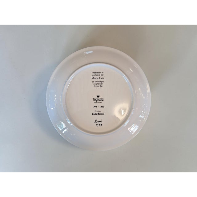 Decorative porcelain plate by Enrico Baj, made by Media Italia with Tognana in the 1990s. This plate is a multiple of 1300...